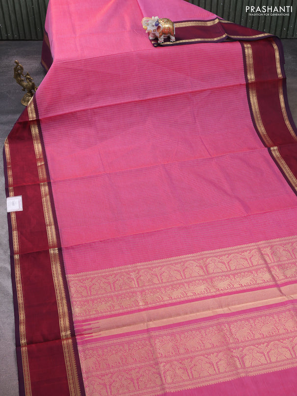Kanchipuram silk cotton saree dual shade of red and maroon with allover zari stripe pattern and rettapet zari woven border