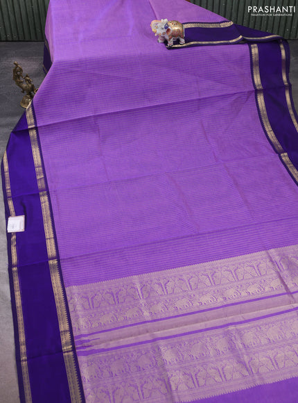 Kanchipuram silk cotton saree lavender and blue with allover zari stripe pattern and rettapet zari woven border