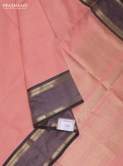 Kanchipuram silk cotton saree peach orange and black with allover zari stripe pattern and rettapet zari woven border