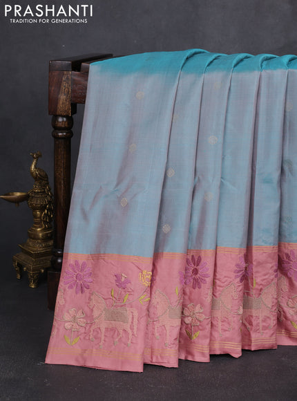 Pure soft silk saree dual shade of teal blue and peach shade with zari woven buttas and zari woven embroidery border