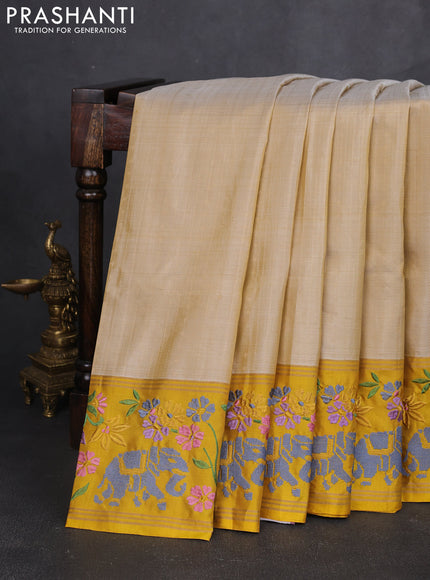 Pure soft silk saree cream and yellow with allover zari weaves and zari woven embroidery border