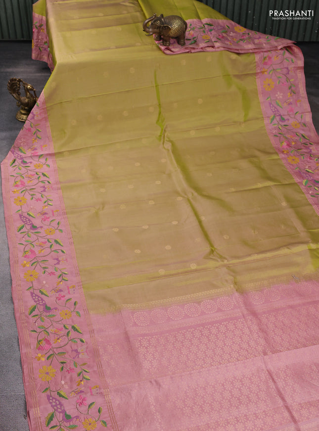 Pure soft silk saree dual shade of light green and peach shade with zari woven buttas and zari woven embroidery border