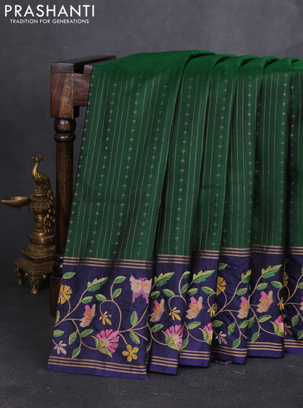 Pure soft silk saree green and navy blue with allover zari weaves and zari woven embroidery border