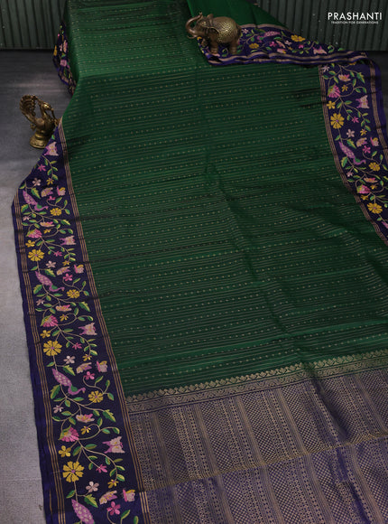 Pure soft silk saree green and navy blue with allover zari weaves and zari woven embroidery border