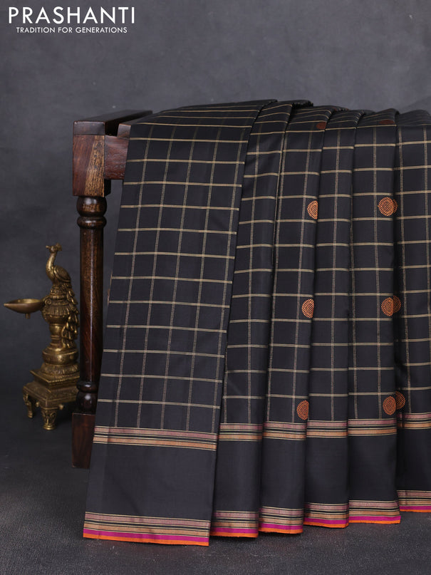 Pure kanchipuram silk saree black with allover zari checks & buttas and rettapet zari woven border