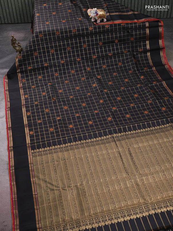 Pure kanchipuram silk saree black with allover zari checks & buttas and rettapet zari woven border