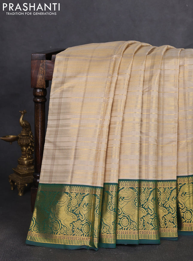 Pure kanchipuram silk saree beige and green with allover zari woven checked pattern and rich zari woven border