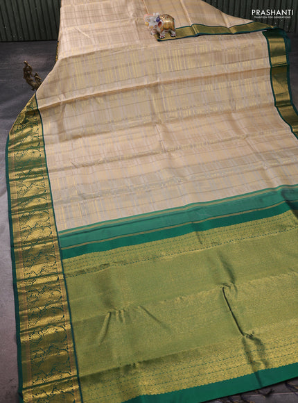Pure kanchipuram silk saree beige and green with allover zari woven checked pattern and rich zari woven border