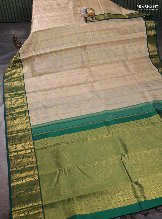 Pure kanchipuram silk saree beige and green with allover zari woven checked pattern and rich zari woven border