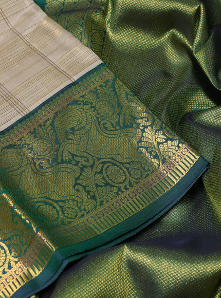 Pure kanchipuram silk saree beige and green with allover zari woven checked pattern and rich zari woven border