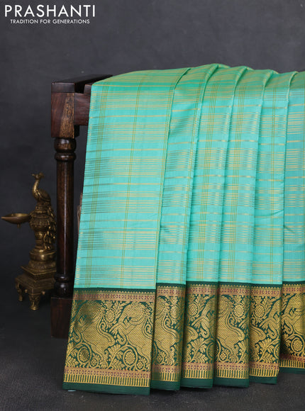 Pure kanchipuram silk saree teal shade and green with allover zari woven checked pattern and rich zari woven border