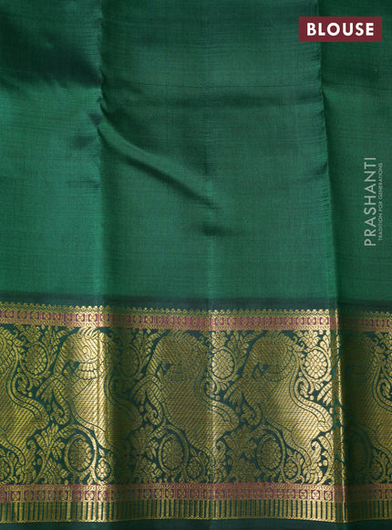 Pure kanchipuram silk saree teal shade and green with allover zari woven checked pattern and rich zari woven border