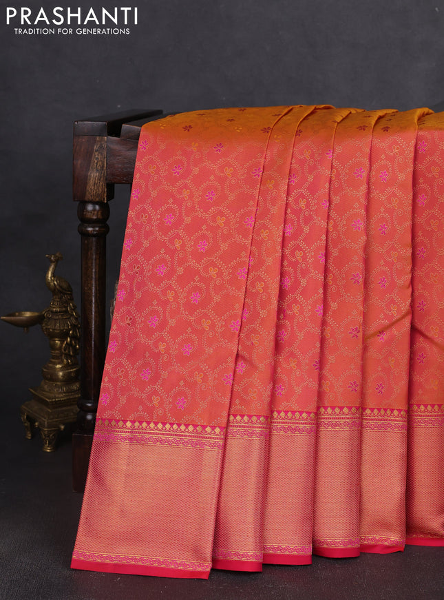 Pure kanchipuram silk saree dual shade of pinkish orange and pink with allover zari woven brocade weaves and rich zari woven border