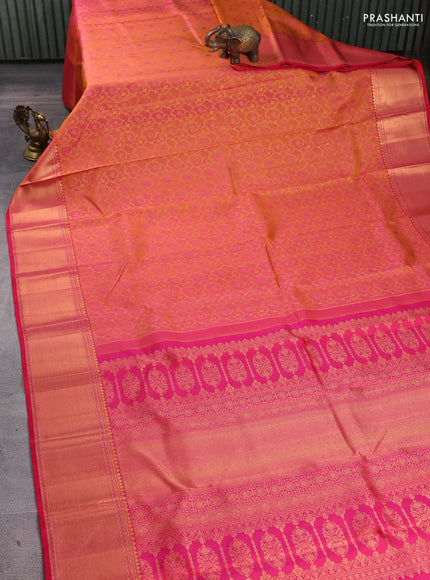 Pure kanchipuram silk saree dual shade of pinkish orange and pink with allover zari woven brocade weaves and rich zari woven border