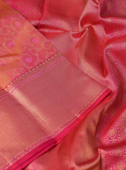 Pure kanchipuram silk saree dual shade of pinkish orange and pink with allover zari woven brocade weaves and rich zari woven border