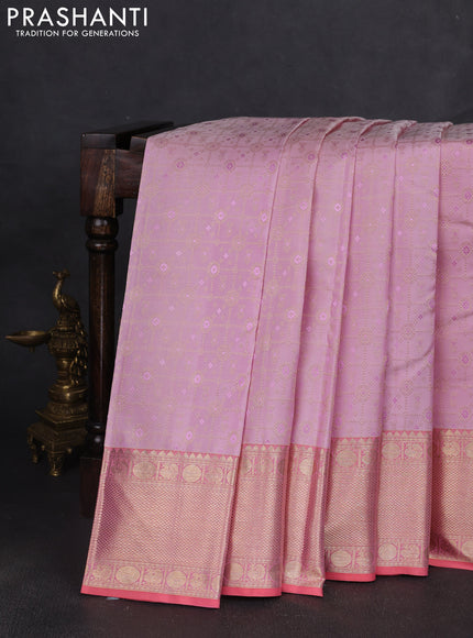 Pure kanchipuram silk saree mild lavender and peach pink with allover zari woven brocade weaves and rich zari woven border