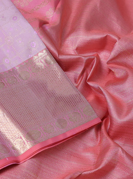 Pure kanchipuram silk saree mild lavender and peach pink with allover zari woven brocade weaves and rich zari woven border