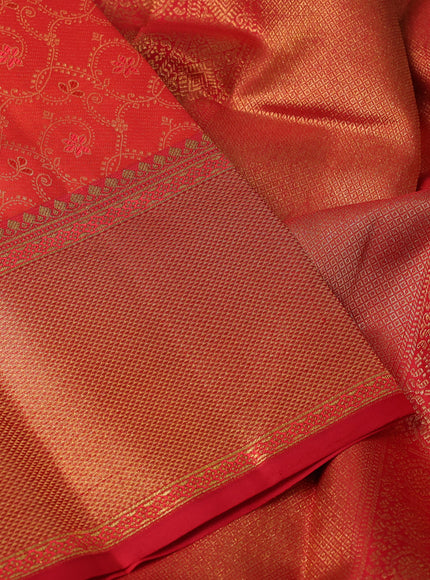 Pure kanchipuram silk saree orange and red with allover zari woven brocade weaves and rich zari woven border
