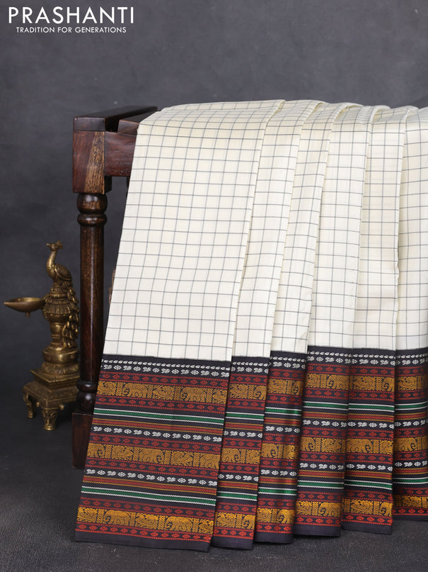 Pure kanchipuram silk saree cream and black with allover thread woven checked pattern and long thread woven korvai border