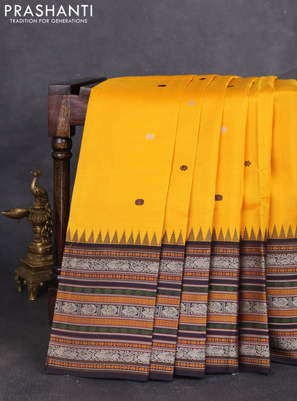 Pure kanchipuram silk saree yellow and deep jamun with thread woven buttas and long temple design thread woven border