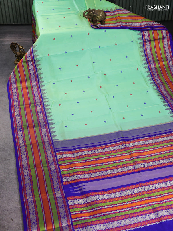 Pure kanchipuram silk saree teal green shade and royal blue with thread woven buttas and long temple design thread woven border