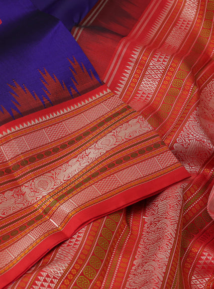 Pure kanchipuram silk saree blue and orange with thread woven buttas and long temple design thread woven border