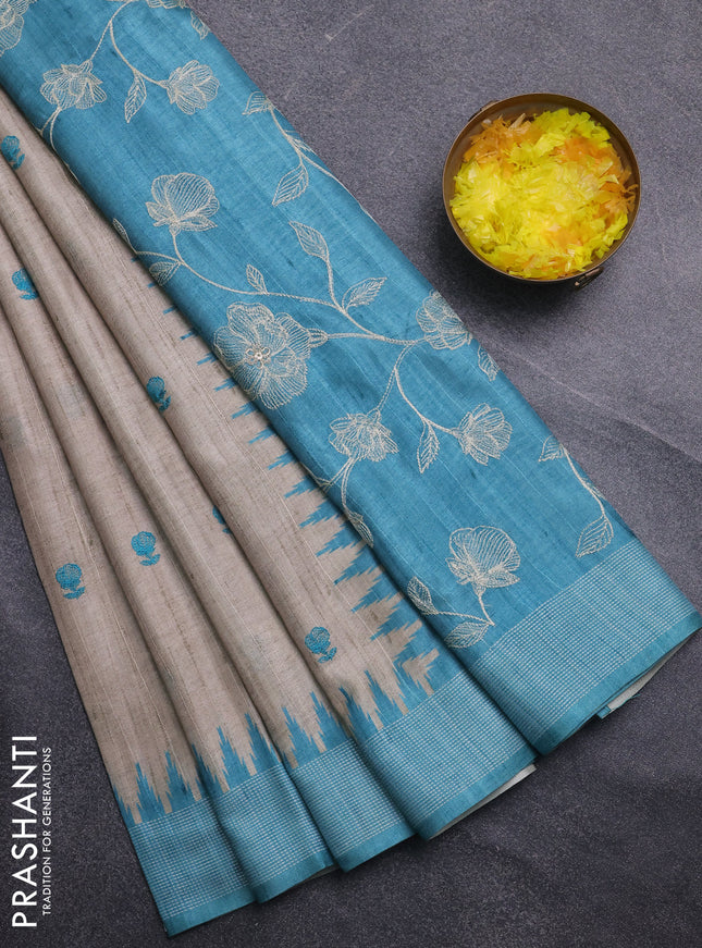 Art tussar saree beige and teal blue with embroidery buttas and temple design thread woven border
