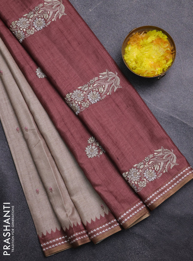 Art tussar saree beige and pastel maroon with embroidery buttas and temple design thread woven border