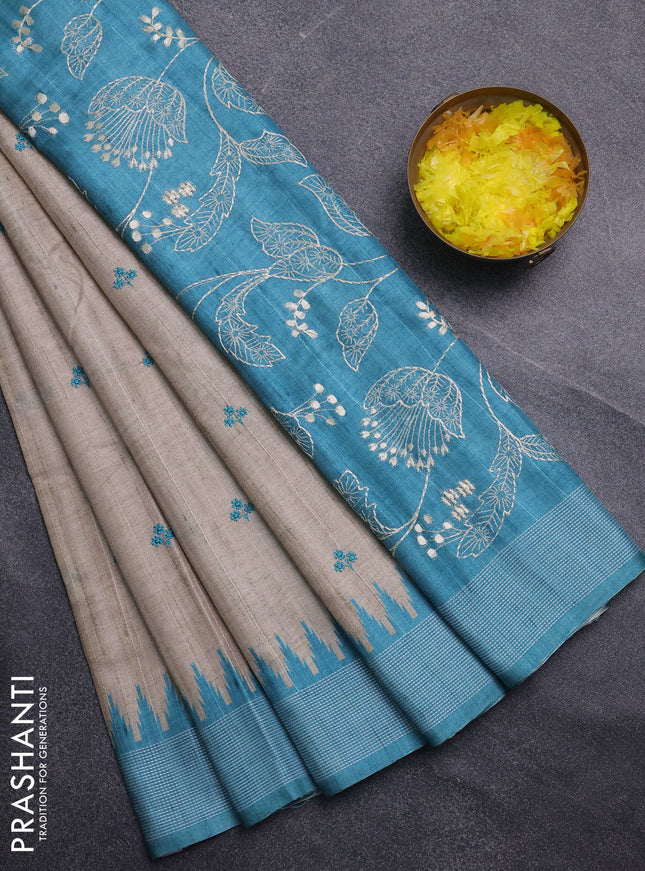 Art tussar saree beige and teal blue with embroidery buttas and temple design thread woven border