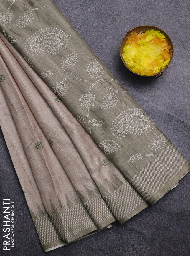 Art tussar saree beige and peach pink with embroidery buttas and temple design thread woven border
