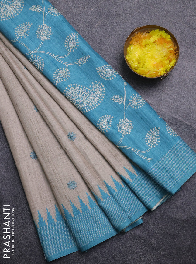 Art tussar saree beige and teal blue with embroidery buttas and temple design thread woven border