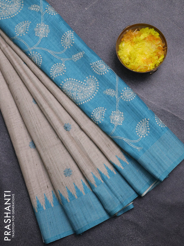 Art tussar saree beige and teal blue with embroidery buttas and temple design thread woven border