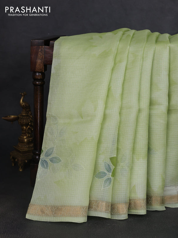 Silk kota saree pista green with floral prints & pita work and zari woven border