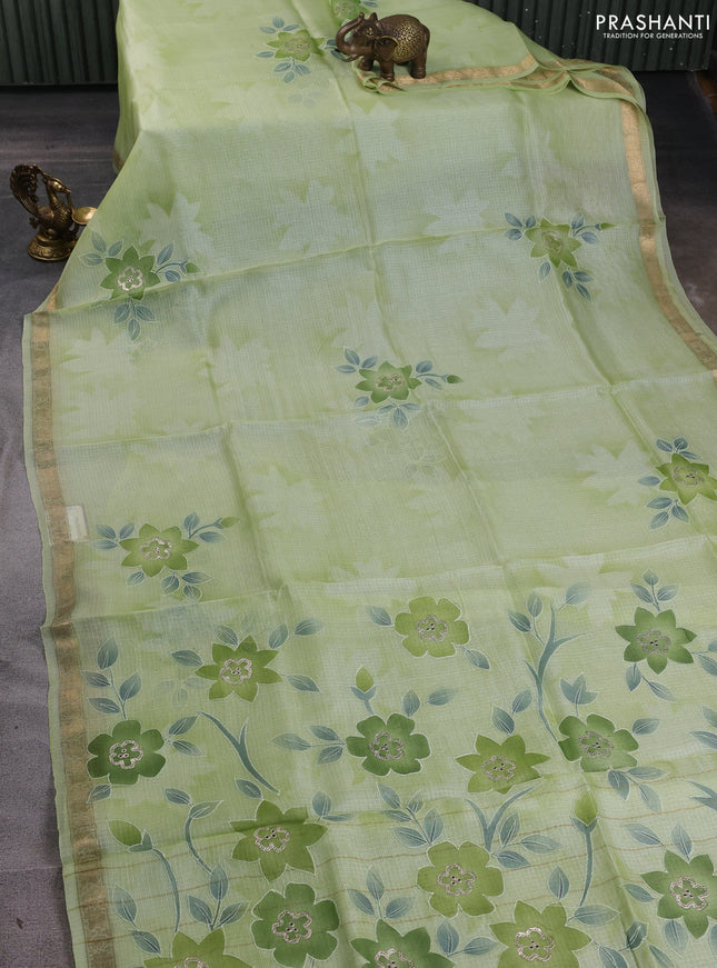Silk kota saree pista green with floral prints & pita work and zari woven border