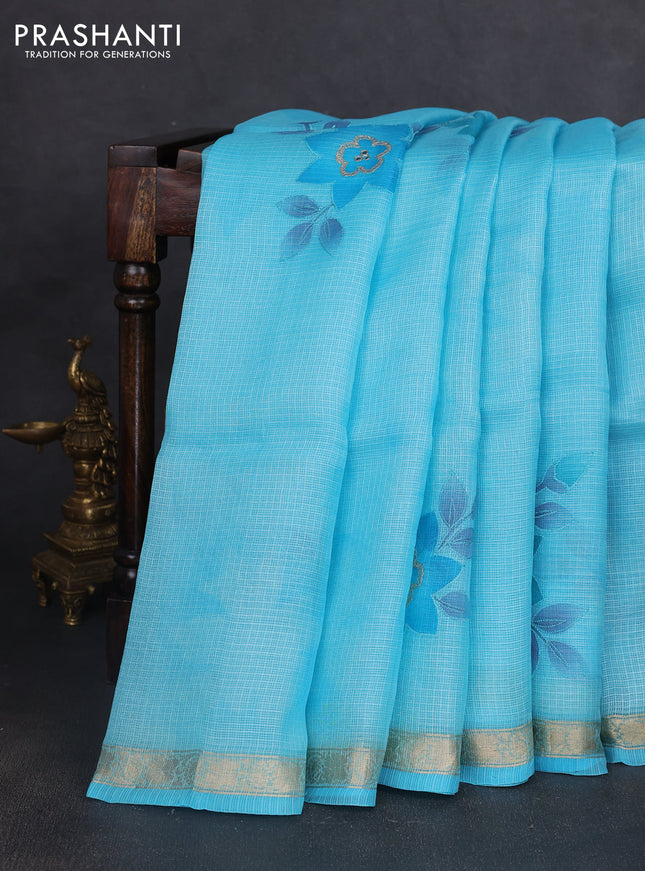 Silk kota saree light blue with floral prints & pita work and zari woven border