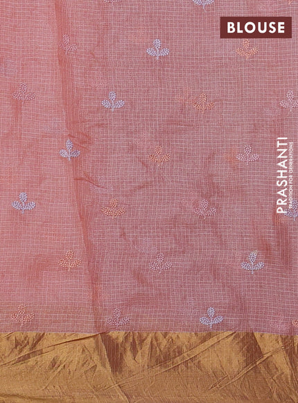 Silk kota saree dark peach with allover floral embroidery work and zari woven border