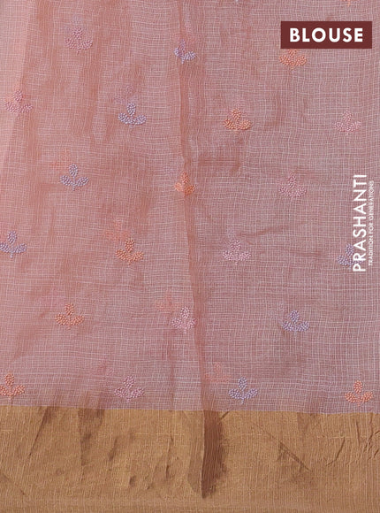 Silk kota saree peach orange with allover floral embroidery work and zari woven border