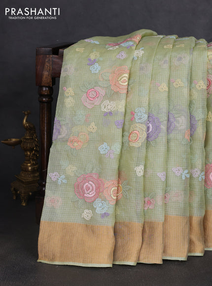 Silk kota saree pista green with allover floral embroidery work and zari woven border
