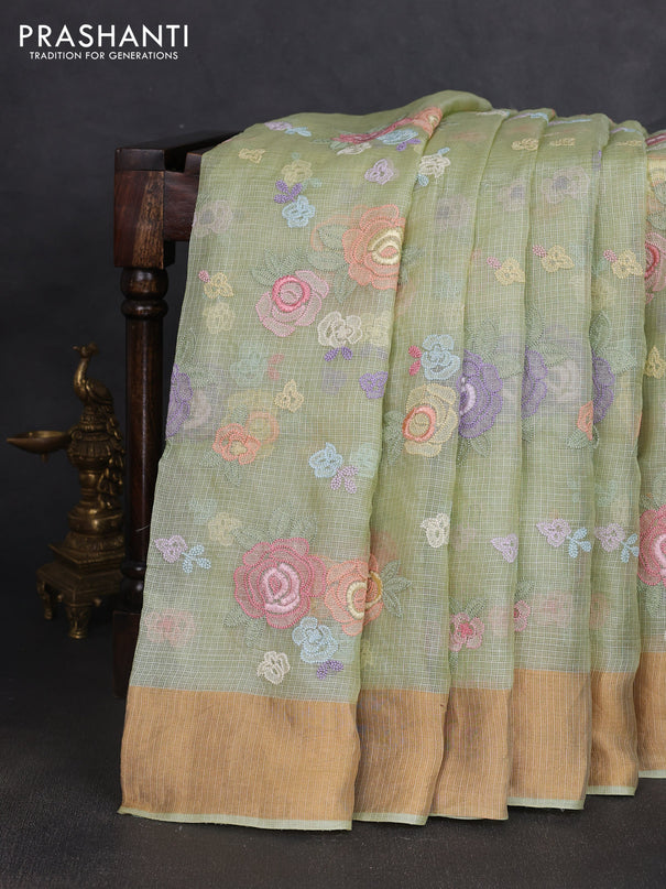 Silk kota saree pista green with allover floral embroidery work and zari woven border