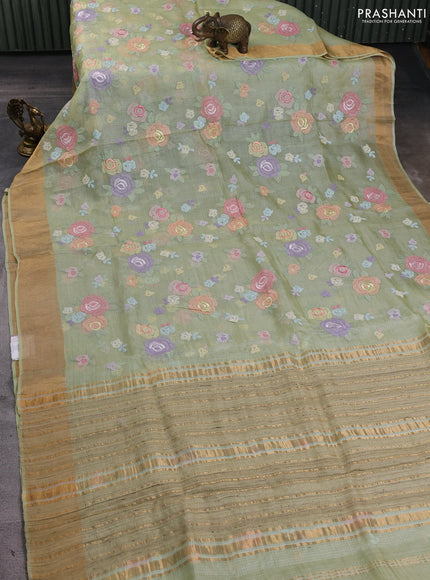 Silk kota saree pista green with allover floral embroidery work and zari woven border