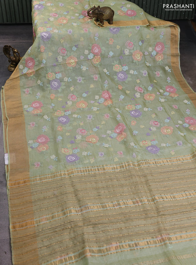 Silk kota saree pista green with allover floral embroidery work and zari woven border