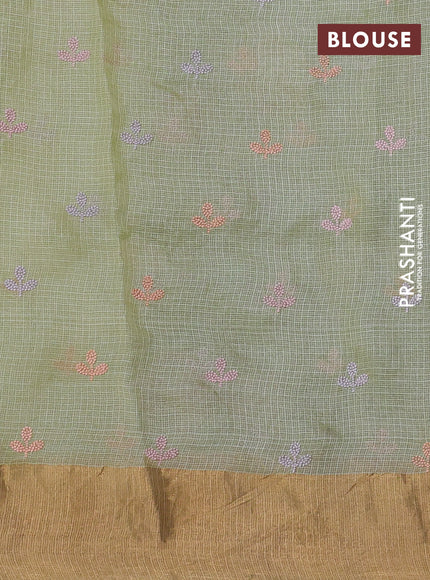 Silk kota saree pista green with allover floral embroidery work and zari woven border
