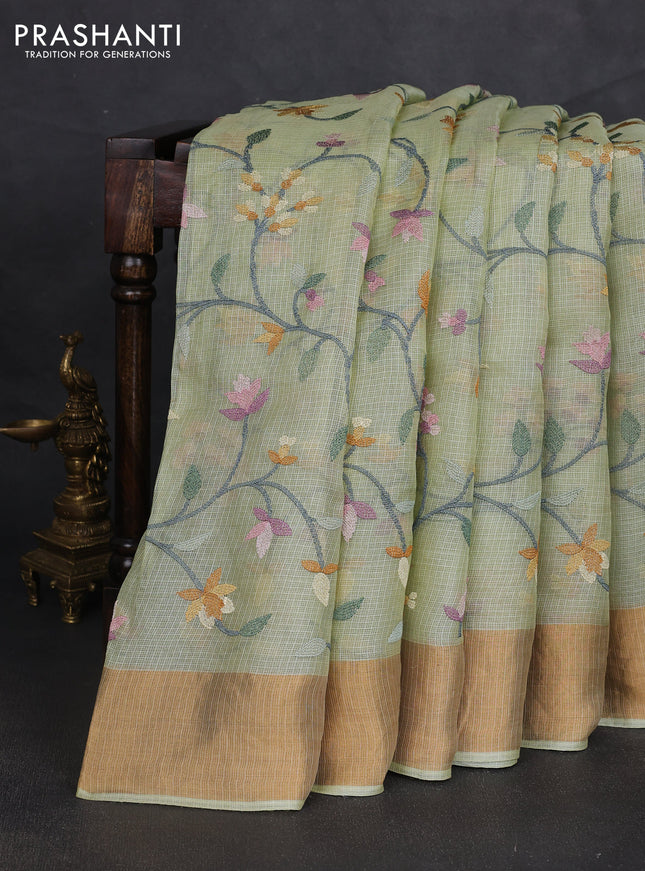 Silk kota saree pista green with allover floral embroidery work and zari woven border