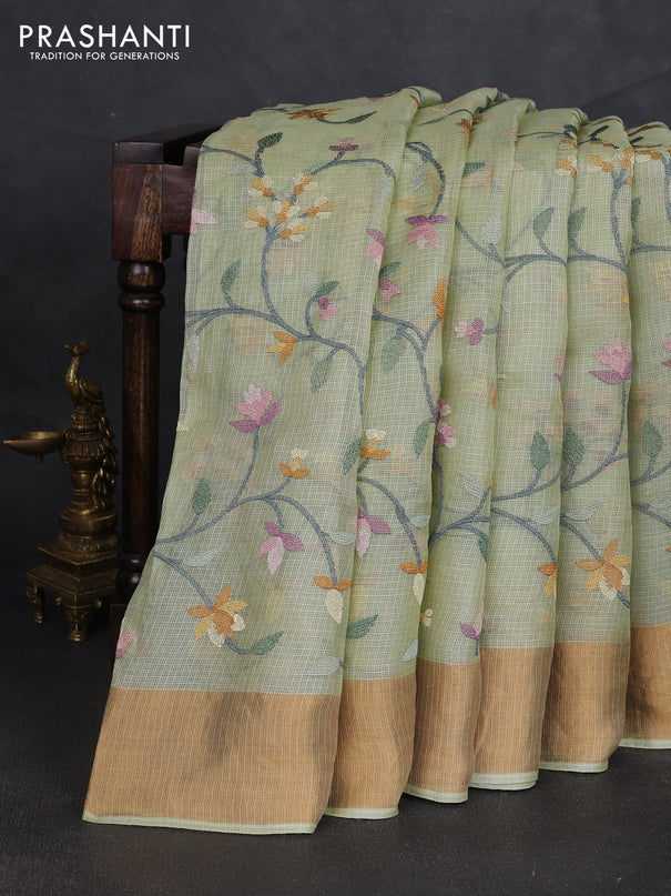 Silk kota saree pista green with allover floral embroidery work and zari woven border