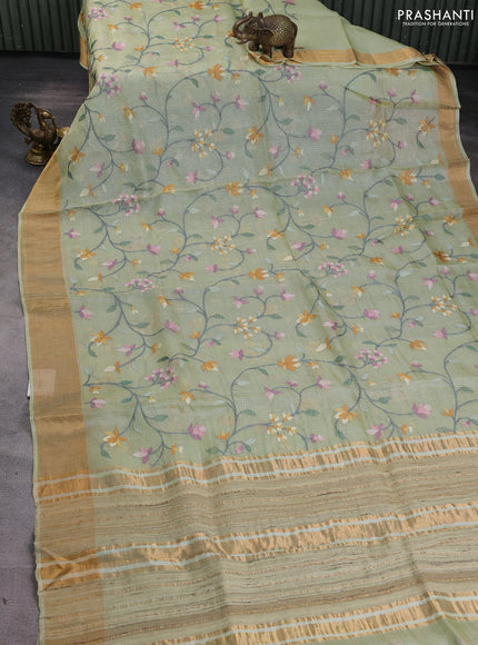 Silk kota saree pista green with allover floral embroidery work and zari woven border