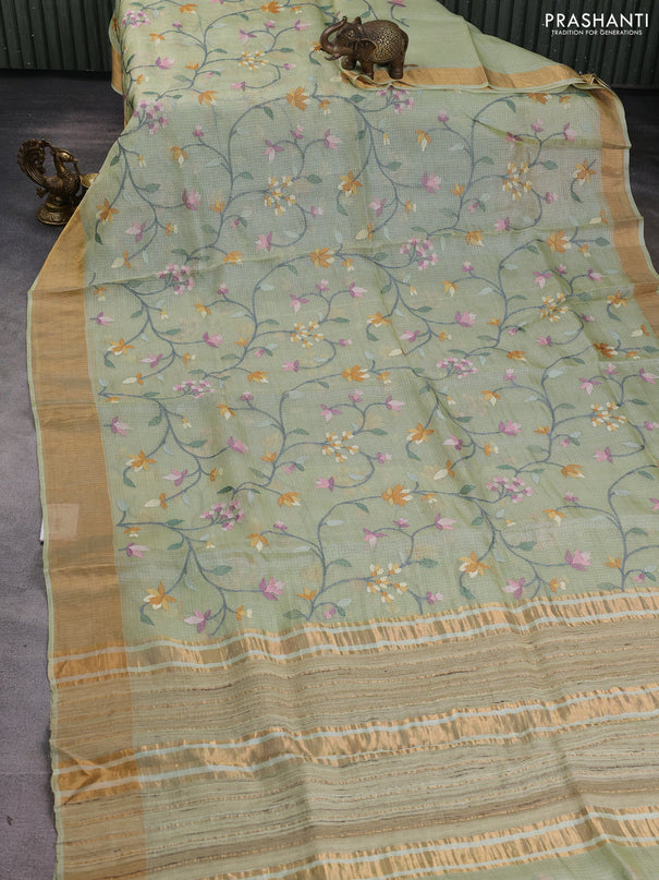 Silk kota saree pista green with allover floral embroidery work and zari woven border
