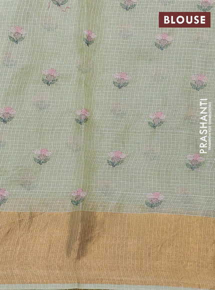 Silk kota saree pista green with allover floral embroidery work and zari woven border