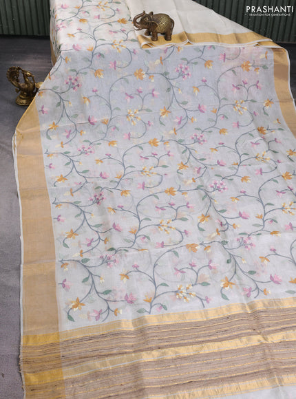 Silk kota saree cream with allover floral embroidery work and zari woven border
