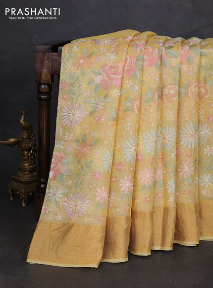 Silk kota saree yellow with allover floral embroidery work and zari woven border
