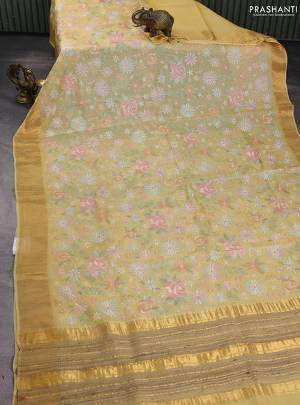 Silk kota saree yellow with allover floral embroidery work and zari woven border